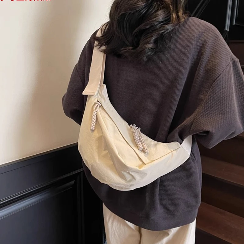 Large Capacity Dumpling Bag for Women 2025 New Lightweight Broadband Crossbody Bag Nylon Canvas Commuting Bag Sports Cycling Bag
