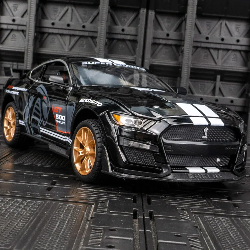 1:24 Ford Shelby GT500 alloy car model steering pull-back acousto-optic toy door and hood trunk can be opened.