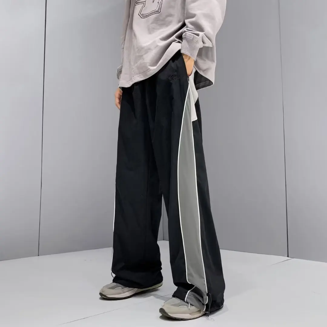 Pantalones deportivos de secado rápido para hombre, ropa de calle activa, pantalones de pierna ancha de tendencia japonesa, pantalones de M-XXXL de gran tamaño empalmados de retazos de verano