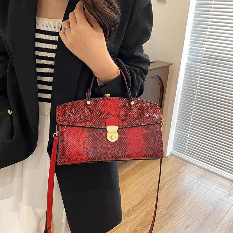 Fashion Handbag 2024 Wwomen\'s New Crossbody Leather Purse Serpentine Pattern Designer Bucket Luxury Brand Solid Color Tote Bag