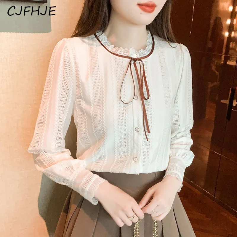 CJFHJE New Women's Lace Bow Long Sleeved Bottom Shirt Spring Vintage Wooden Ear Edge Hollow Fashion Women Solid Color Shirt Top