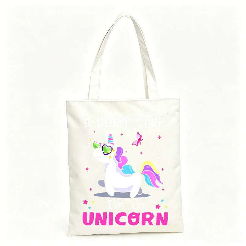 Women's fantasy creature print canvas tote bag with slogan-style graphic, ideal for casual shopping and daily use