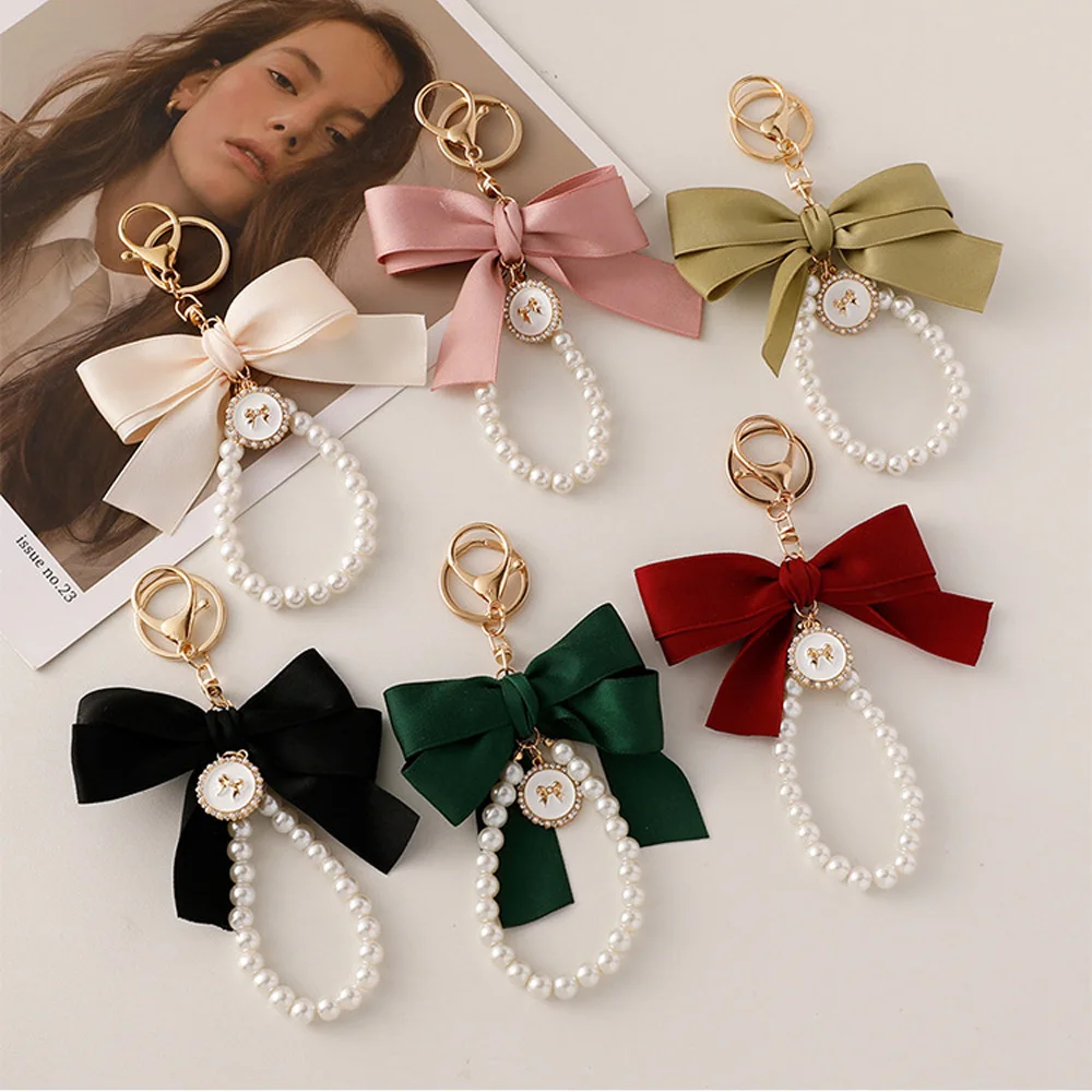 ?Fashion Big Bow Tie Key Chain Imitation Pearl Keyholder Metal Buckle Women Bag Charms Sweet Keychain Headphone Case Accessories