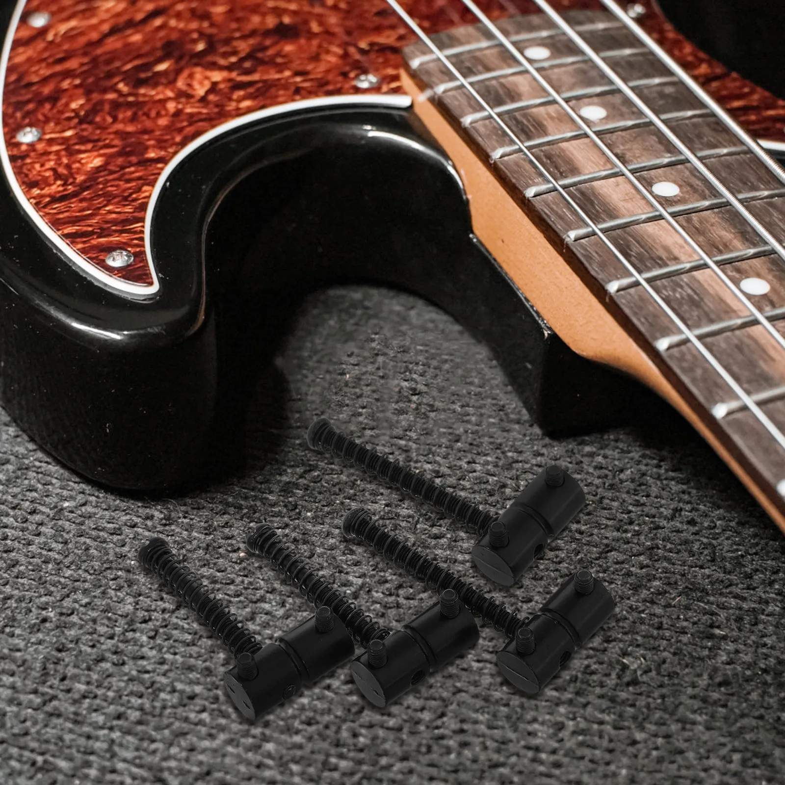 

4Pcs Bass Bridge Saddle for Four String Bass Guitar Replacement Metal Saddle with Silver Finish Stable Tuning Smooth Playability