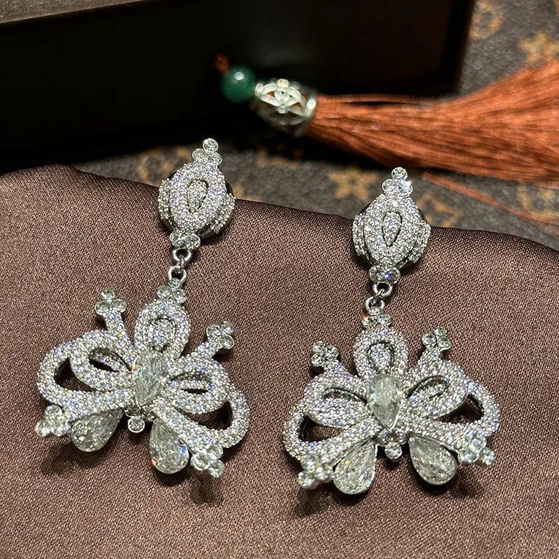 Hollow long bow earrings Bridal banquet dress studs ear accessory advanced jewelry