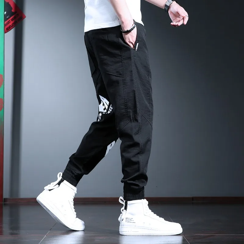 Pantalones deportivos informales para hombre, ropa de calle a la moda, con letras impresas, para correr, color negro, holgados, con cordón
