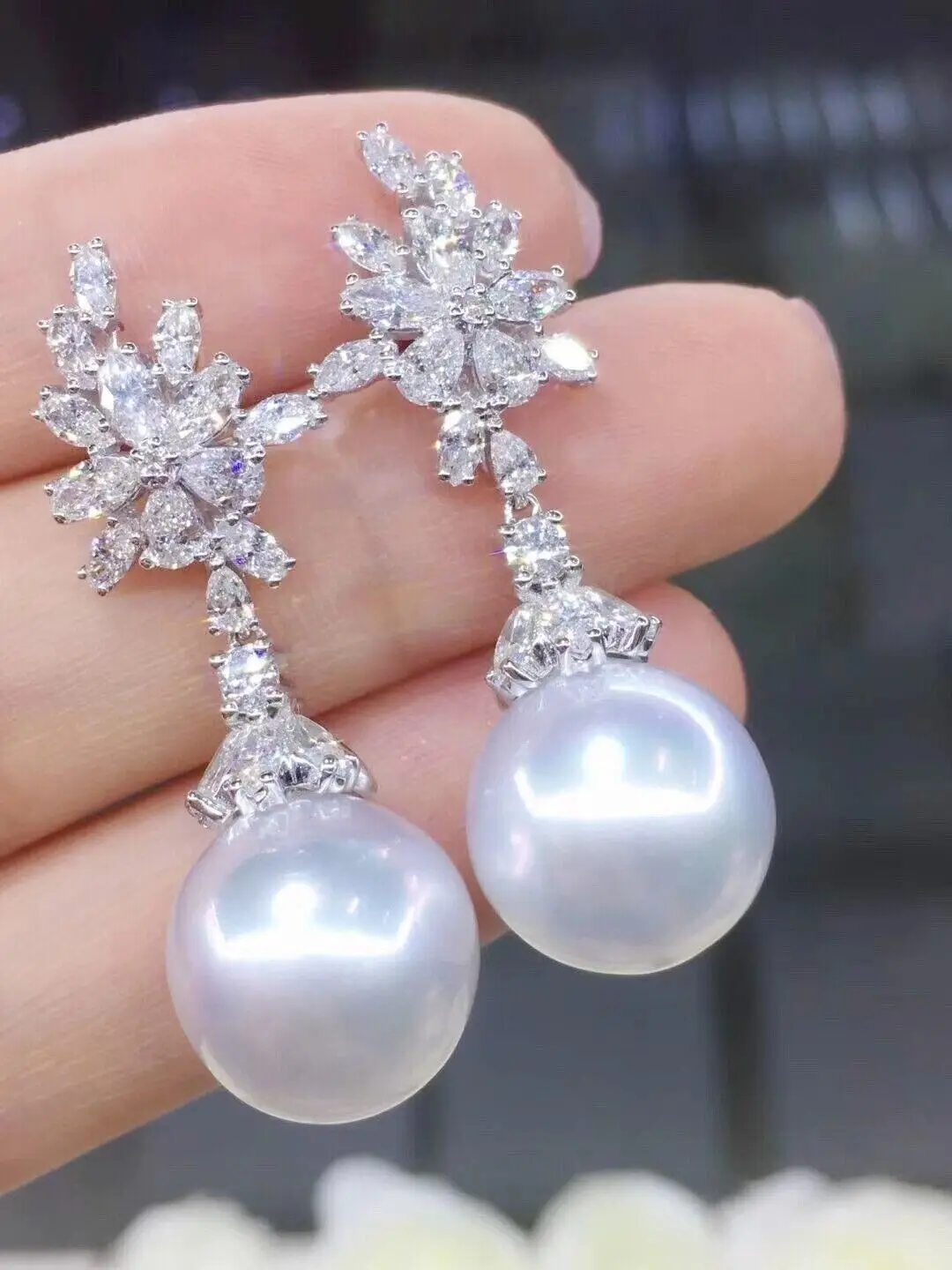 

Large quantity of AAAAA 10-11mm genuine South China Sea natural white pearl earrings 925s