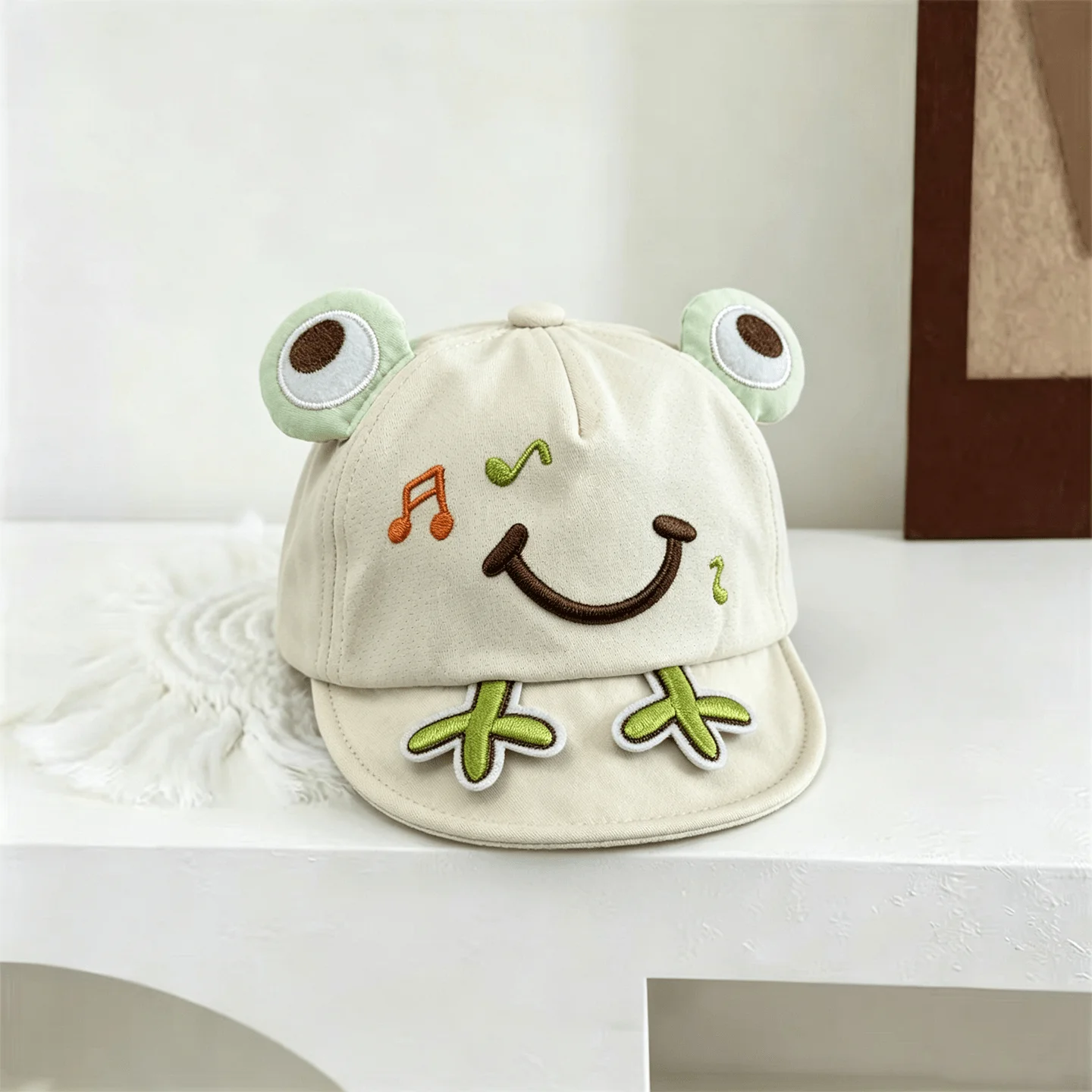 Three-dimensional big-eyed frog-shaped musical note embroidery mesh soft brimmed baseball cap suitable for both boys and girls