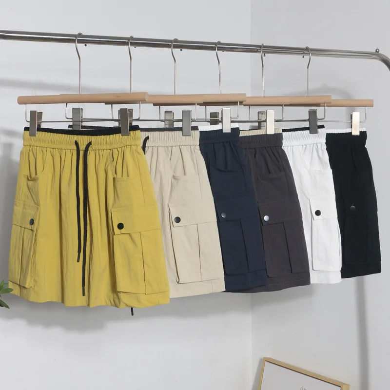 

Autumn New Women's Elastic Waist Drawstring Cargo Skirt New Big Pocket Design Anti-light A-word Skirt