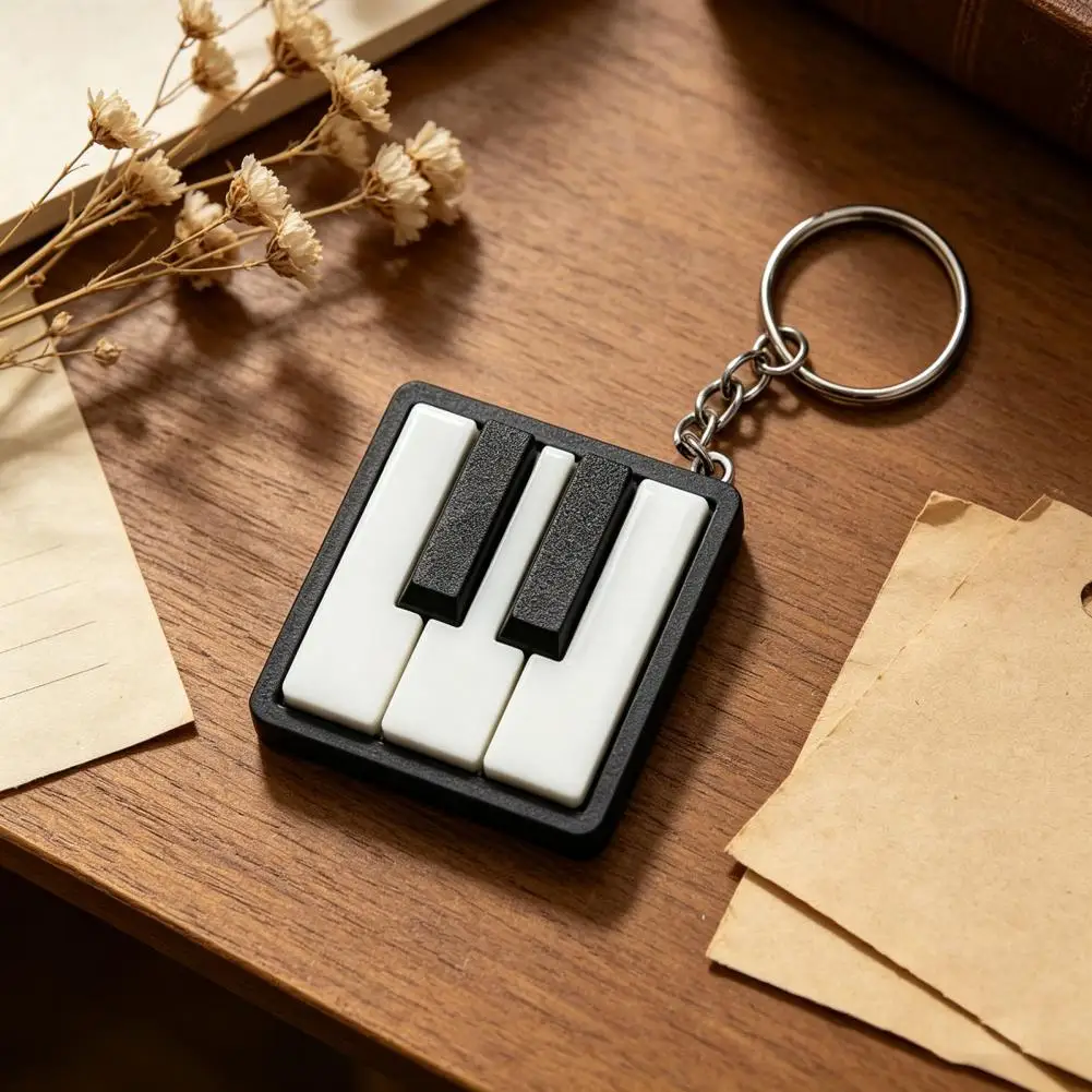 Mini-Klaviertasten-Schlüsselanhänger, spielbares Fingerspitzen-Klavier, Stressabbau-Klavier-Tasten-Klicker-Spielzeug mit Metallring, klassische schwarz-weiße Tasten