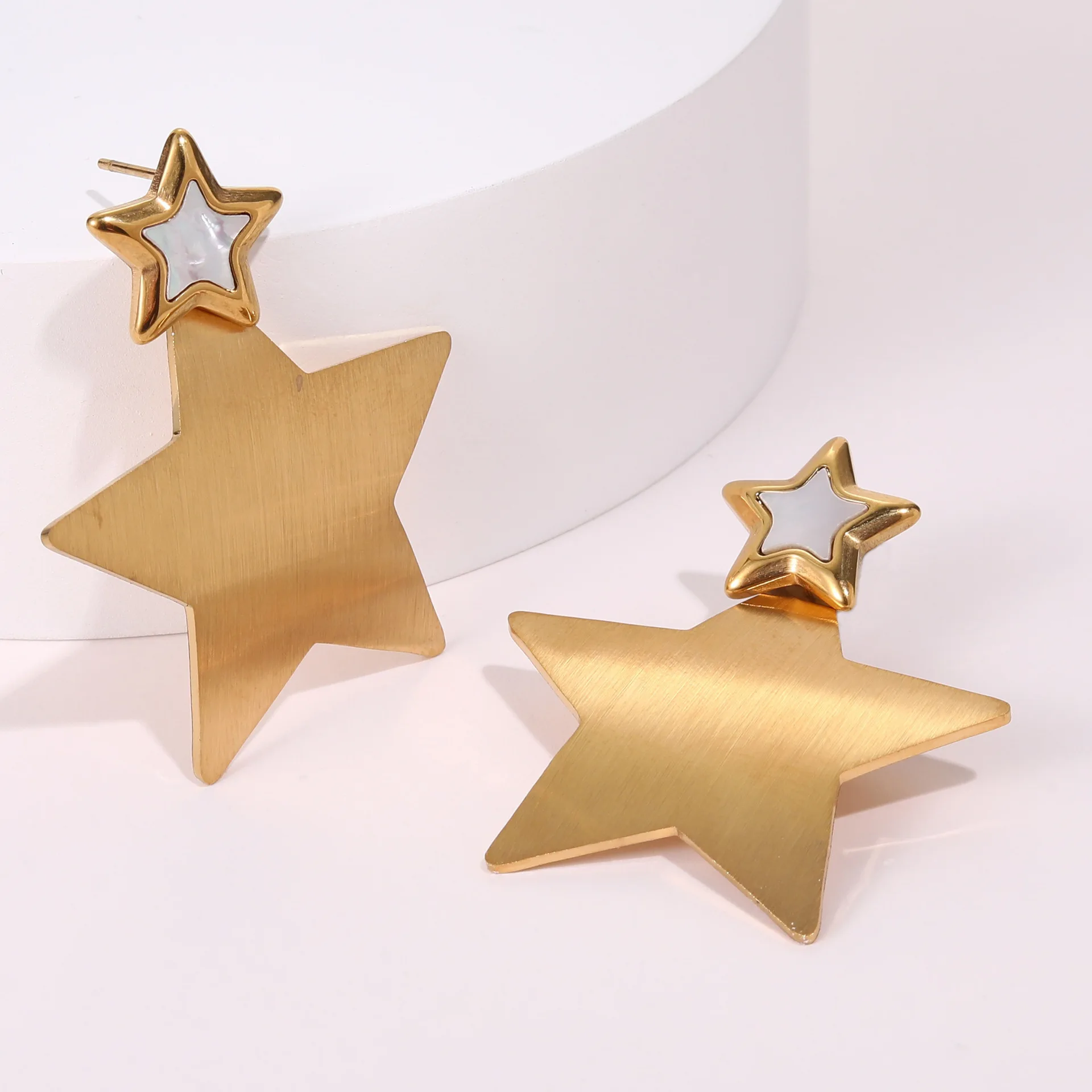 ins personalized pentagram-shaped fritillary hollow design stainless steel earrings plated with 18K gold fashion ear jewelry