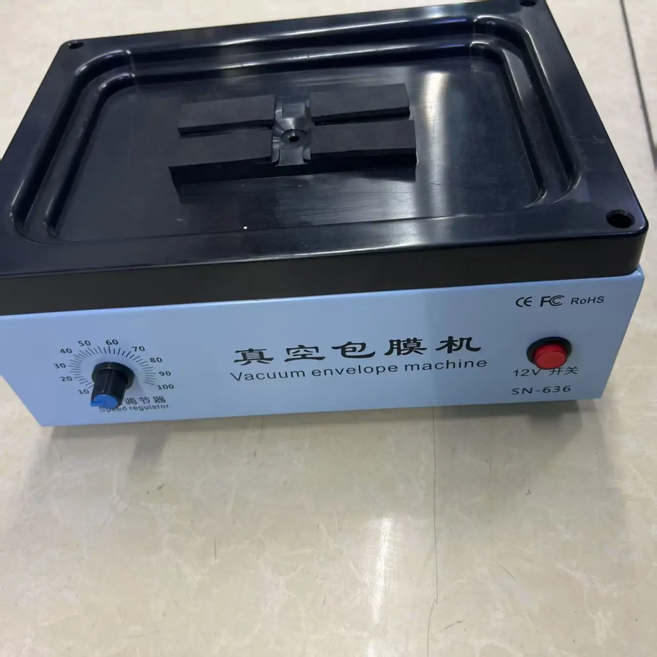 

Mobile Phone Vacuum Film Wrapping Machine for Street Vending, Fully Automatic Film Wrapping Machine