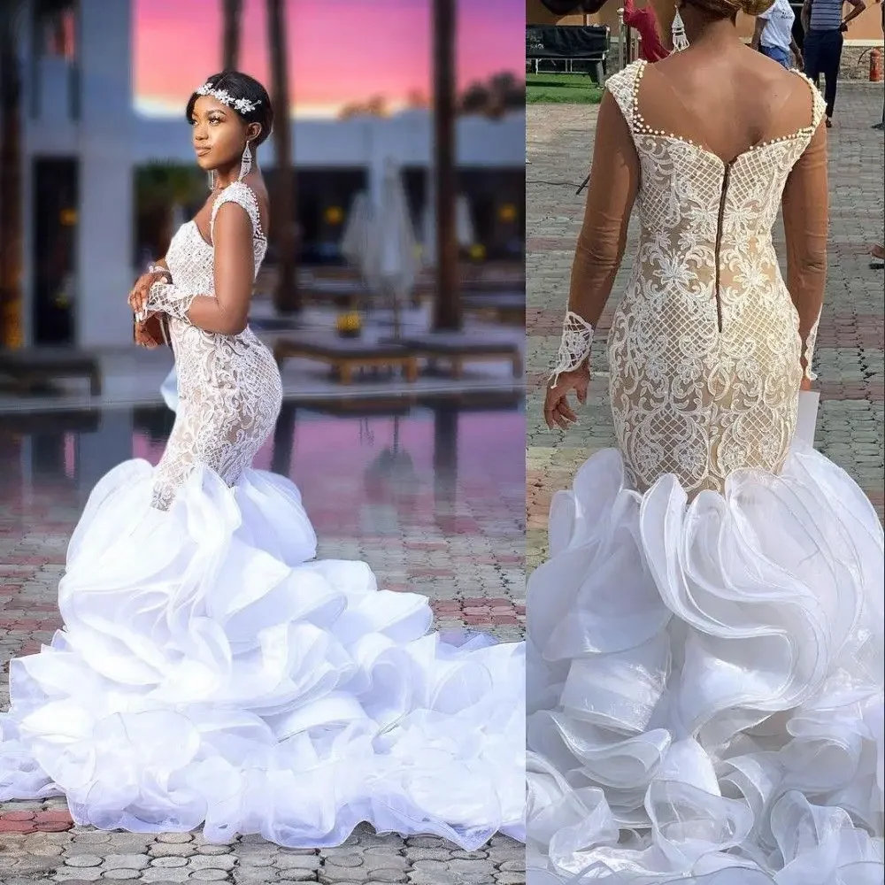 

Customized Mermaid Wedding Gowns Bridal Gowns Sexy Arabic Lace Appliques Long Sleeves Chapel Train Ruffles Tiered Organza Plus S