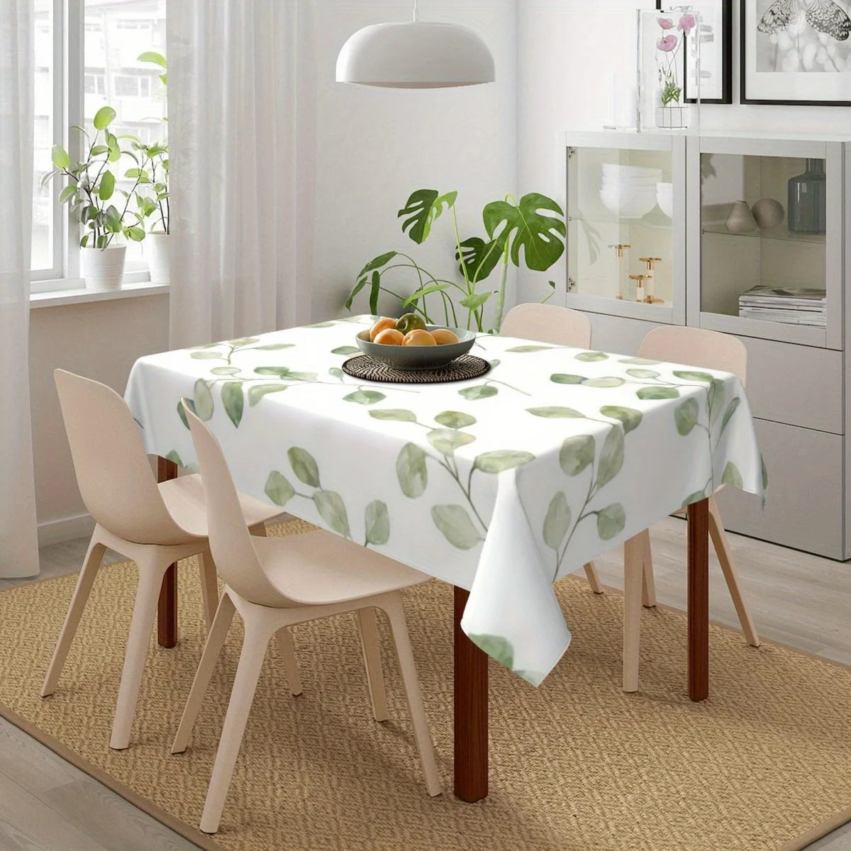 Green small leaf pattern rectangular tablecloth for kitchen and dining room, made of polyester fabric.