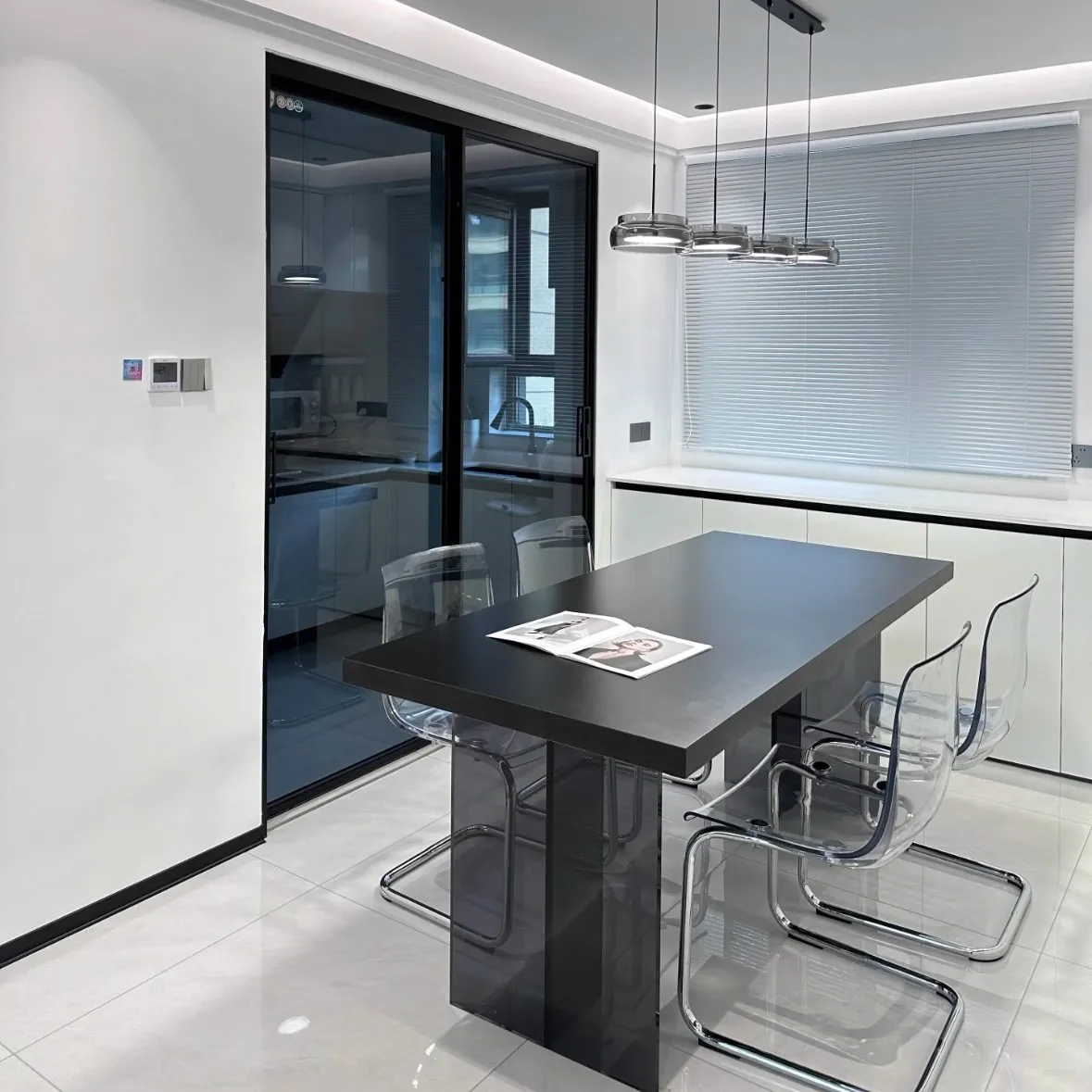 

#Pure Black Modern Minimalist Dining Table with Slab Design for Small Apartments Home Hotels or Villas Comprising Chairs