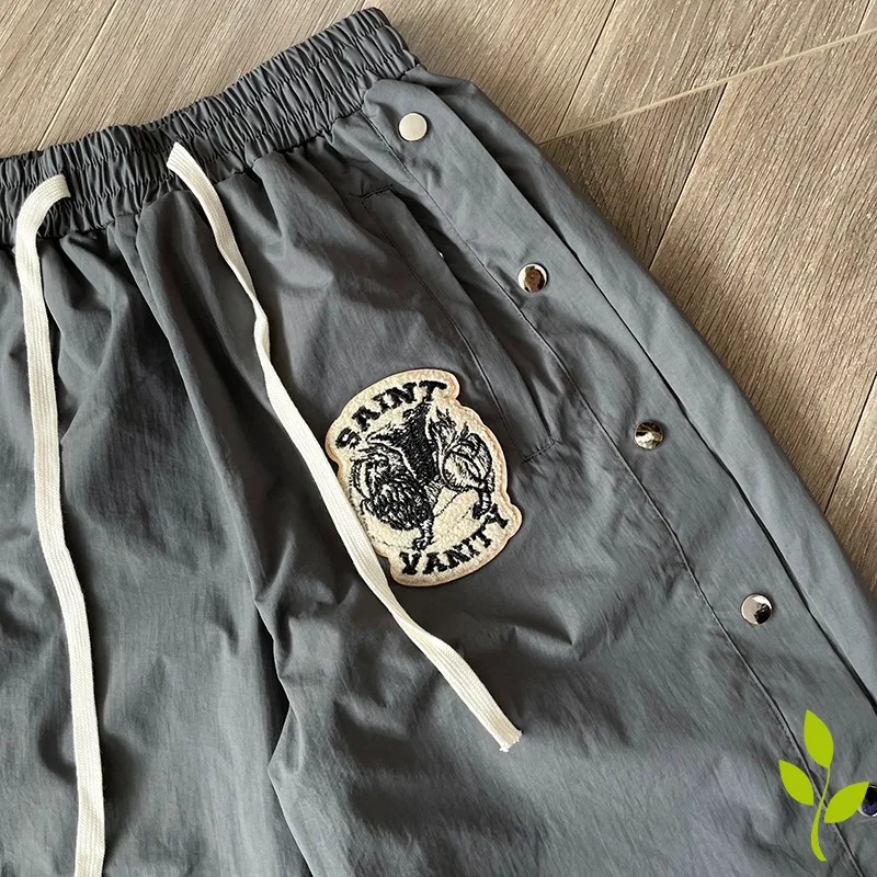 Embroidered Buckle Sports Style SAINT Jacket Casual Windbreaker Jacket Men Women Sunscreen Overcoat Trousers Set