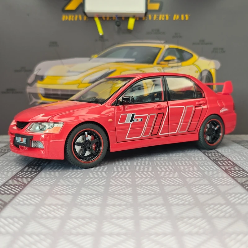 Modelo de aleación de coche de rally Mitsubishi EVO de 9ª generación a escala 1:24, puertas y capó del motor se pueden abrir.