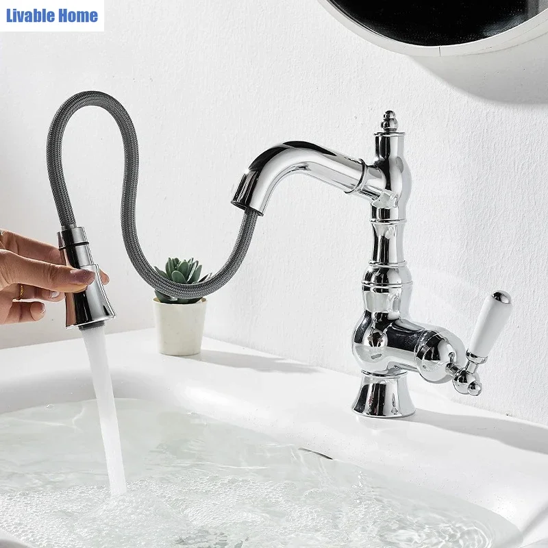 French-style gold-toned brass pull-out mixer tap Luxury vintage bathroom cabinet with ceramic-handled swivel hot/cold mixer tap