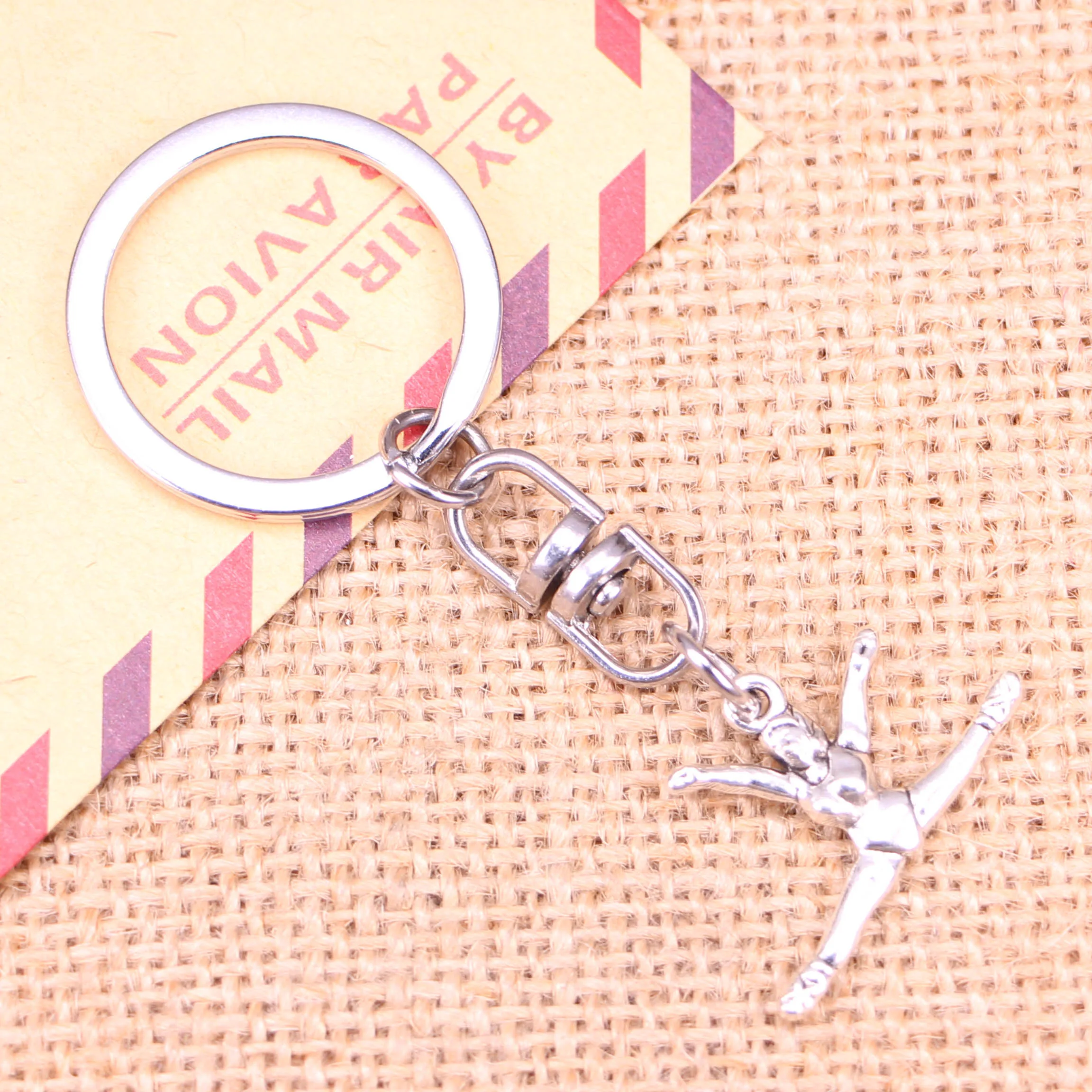 20pcs New Fashion Keychain 22x16mm gymnastics gymnast sporter Pendants DIY Men Jewelry Car Key Chain Souvenir For Gift