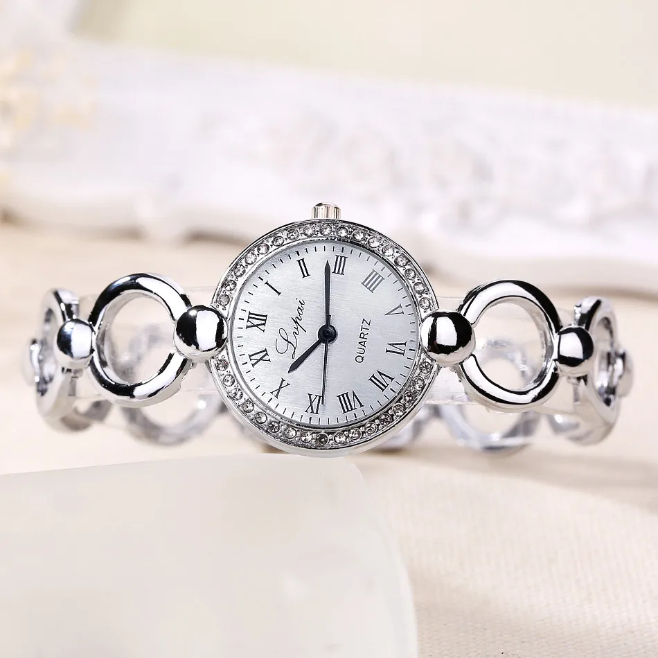 Montre de luxe avec biscuits pour femme, bracelet en acier inoxydable, bracelet à quartz, montres provoqué pour femme, nouvelle mode