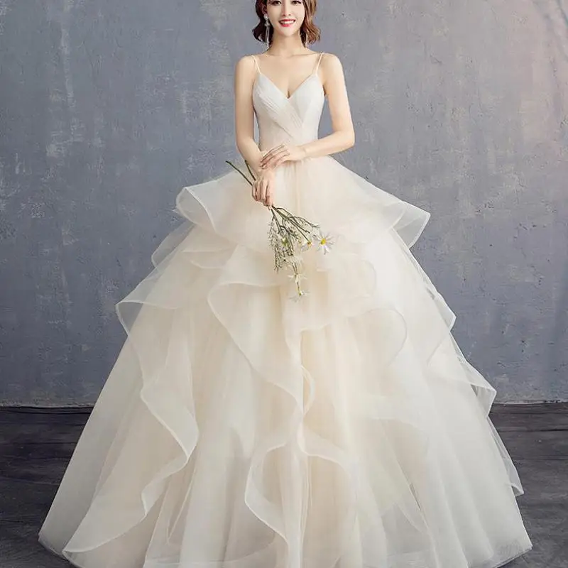 Vestido de novia con tirantes finos a la moda, vestidos de novia clásicos sexis con cuello en V, tul sencillo Sukienka Na Wesele de talla grande personalizado