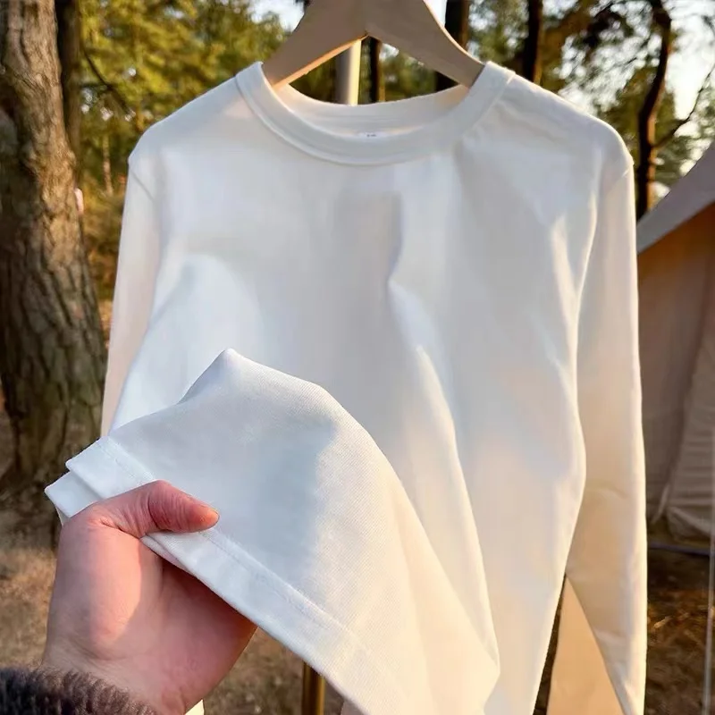 

American Sle Thiened Long Sve Pure Cotton White T-irt Men Women Loose Simple Color oulder Drop Base T-irt