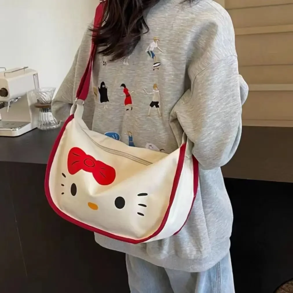 

Hello Kitty Cartoon Woman Canvas Shoulder Bag Sanrio Cute Kt Niche Design Girl Class Large Capacity 100 Saddle Bag Crossbody Bag