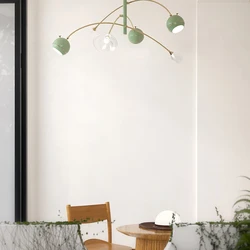 Calder chandelier, sage green living room