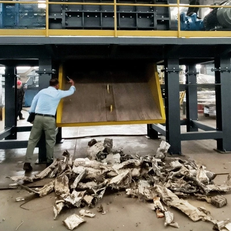 Heavy Duty Dual Shaft Shredder High Yield PLC Controlled High Torque Equipped With Durable Knives For Scrap Metal Old Tire Wood