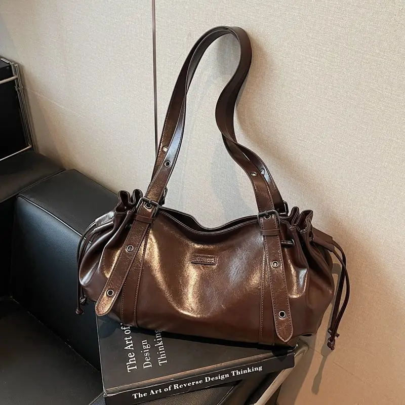 

Ретро однотонная сумка подмышки на шнурке, женская корейская кожаная сумка на плечо большой вместимости, женская роскошная сумка-тоут высокого класса 2025