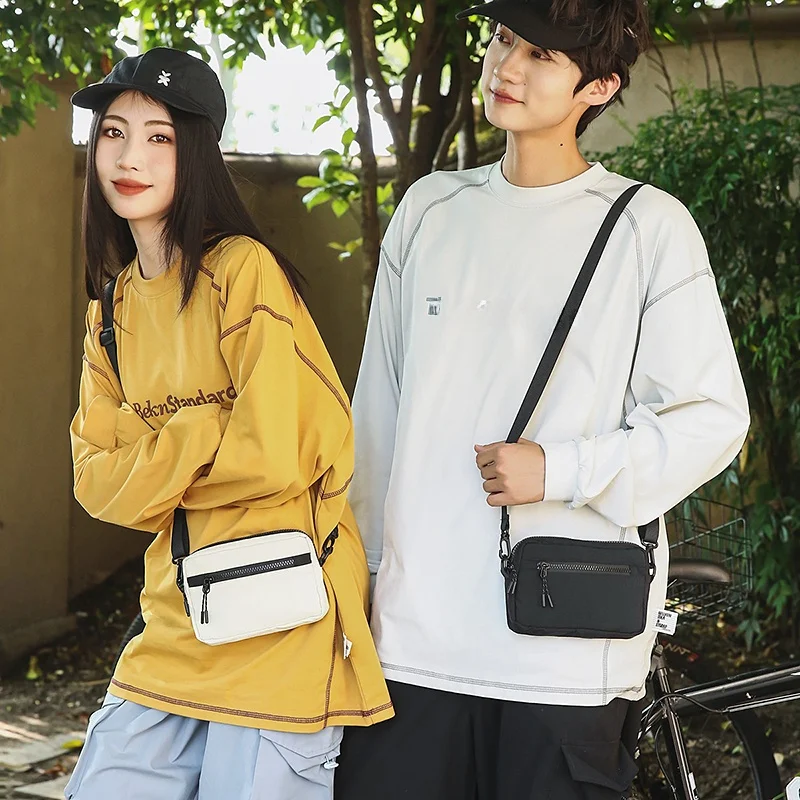 bolsa-transversal-casual-e-moderna-em-tecido-ox-bolsa-portatil-para-celular-versatil-moda-primavera-verao-para-jovens