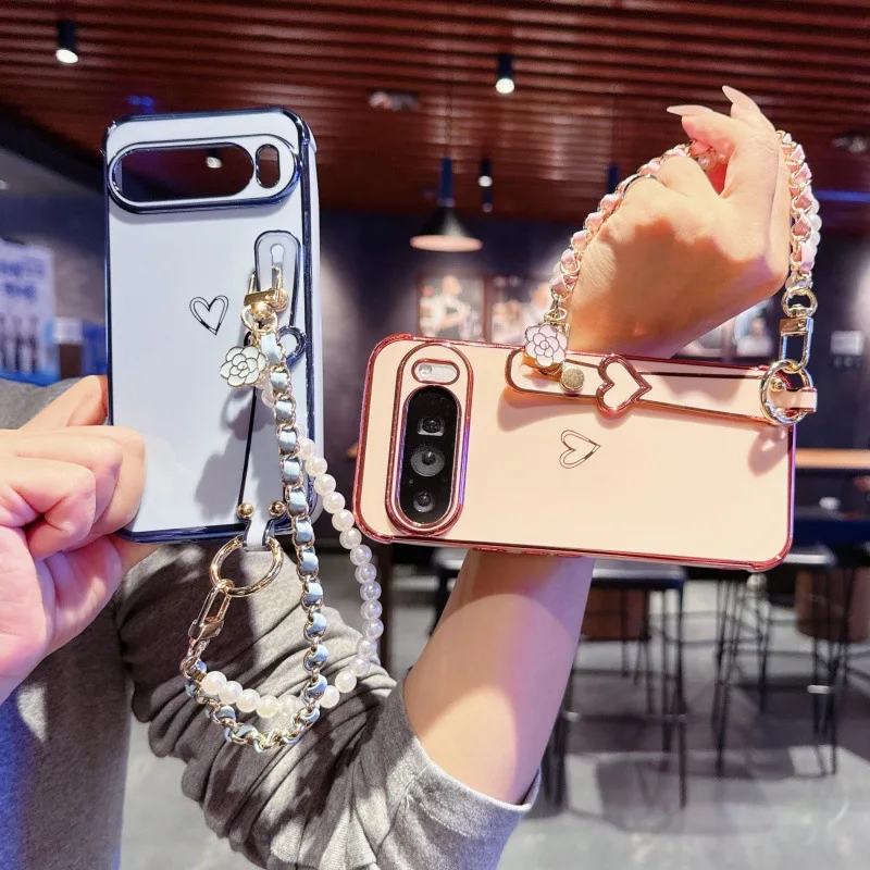 Herzförmige Armband-Handyhülle für Google Pixel 10 Pro XL 9a 8a 7a Stoßfeste Hautfreundliche Schlanke Tragbare Schutzhülle mit Trageriemen