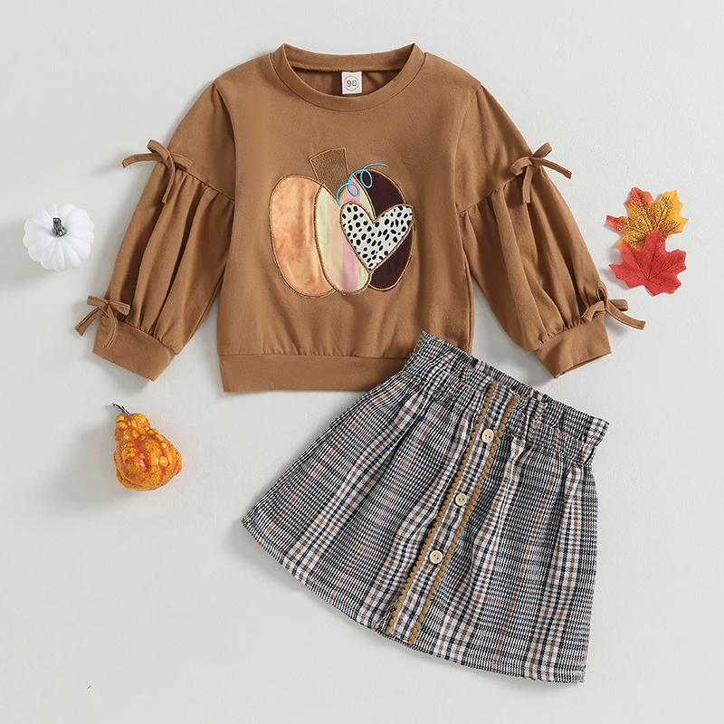 Adorabile completo autunnale per bambina con felpa girocollo con stampa zucca e gonna scozzese - Set di abiti di Halloween da 2 pezzi