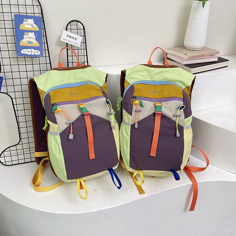 Dopamine color-blocked sports women's backpacks, student schoolbags, waterproof outdoor men's backpacks