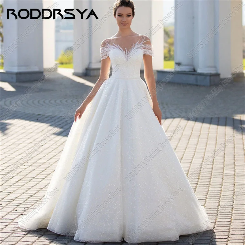 RODDRSYA رومانسية تول زين المحكمة فستان الزفاف أنيقة الترتر س الرقبة Vestidos De Novia مثير زر الظهر حفلة العروس رومانسية تول زين المحكمة فستان الزفاف أنيقة الترتر س الرقبة Vestidos De Novia مثير زر الظهر حفلة العروس