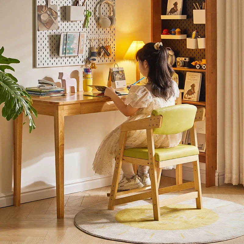 Solid wood children's study chair can be lifted and lowered to adjust the writing chair for primary school students