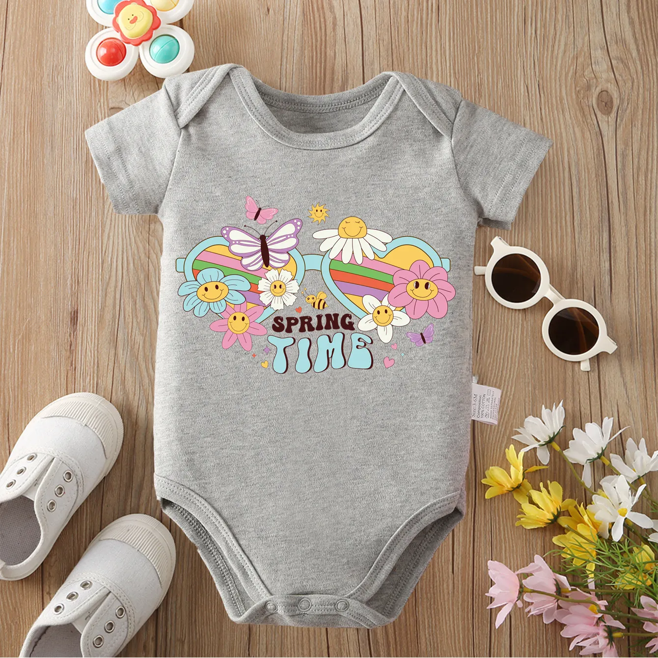 

Хлопковый комбинезон-боди (100% хлопок) с принтом «Цветы и пчелы» для новорожденных от 0 до 12 месяцев. Удобный весенний комбинезон.