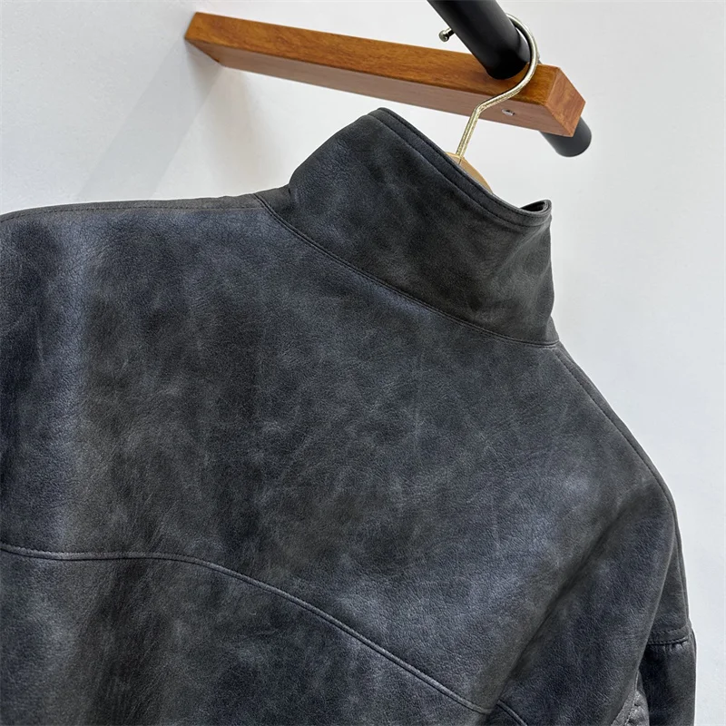 سترة جلدية نسائية معطف نسائي جديد غير متماثل بسحاب لشتاء 2025 سترة دراجة نارية من الجلد الاصطناعي مقاومة للرياح y2k