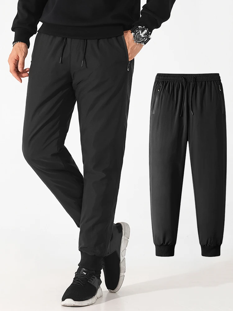 Pantaloni da jogging invernali da uomo Pantaloni caldi imbottiti in piuma d'anatra bianca al 90% di grandi dimensioni 8XL Pantaloni termici freddi da neve antivento