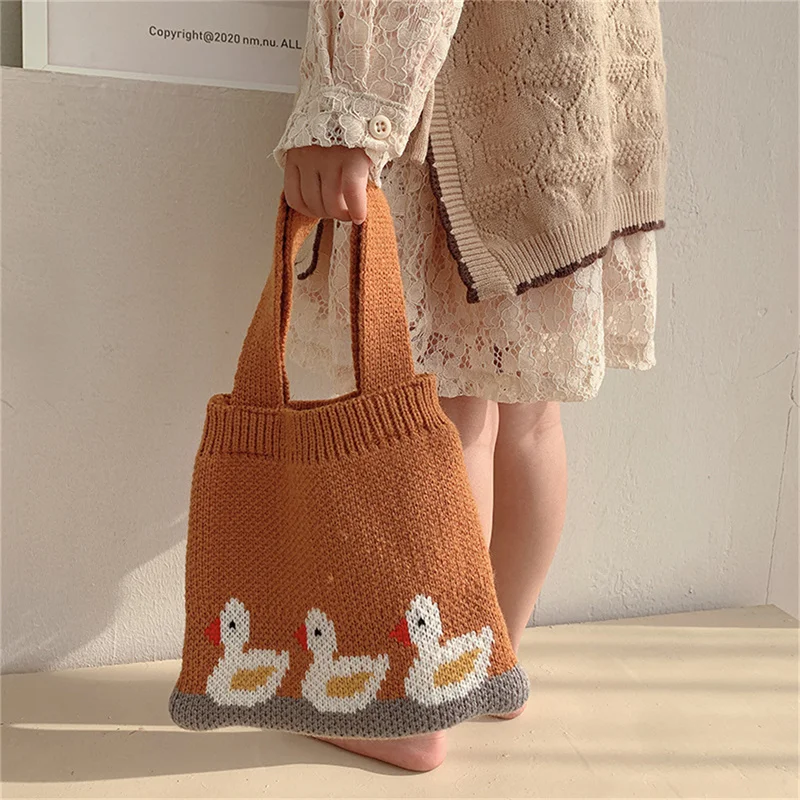 

Children's Cartoon Handbags Girls Cute Duck Knitting Small Bag Autumn And Winter Shoulder Handbag Coin Snacks Storage Box