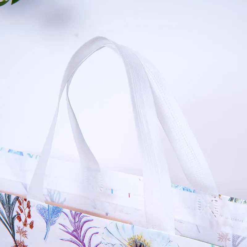 Wiederverwendbare Einkaufstaschen mit Blumenmuster, aus Vliesstoff, faltbar, umweltfreundlich, große Reise- und Aufbewahrungstasche, Einkaufstasche. – Detail 4