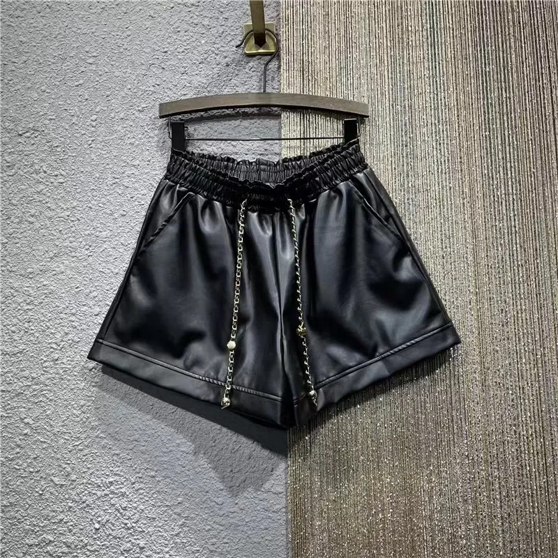 

Новинка 2023 года, летние эластичные атласные свободные шорты трапециевидной формы с высокой талией и широкими штанинами, показывающие длину ног для женщин