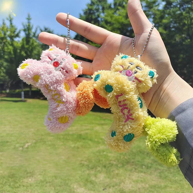 Juguete de peluche de gato de lunares de la suerte de dibujos animados, llavero creativo de Animal de peluche, muñeco de peluche de cola retorcida, colgante de juguete sin cremallera