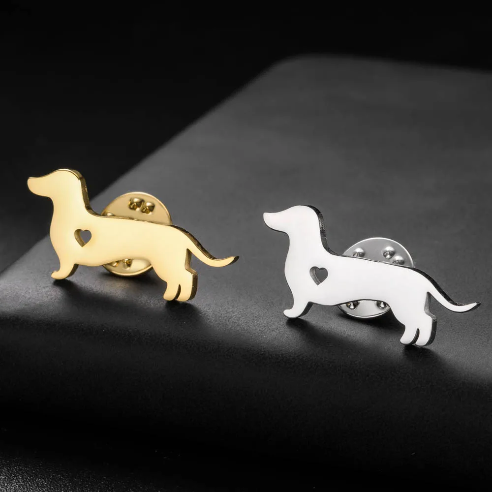Minimalist stainless steel sausage dog lapel pins in polished silver and gold colors featuring a sleek hollow cutout geometric animal silhouette