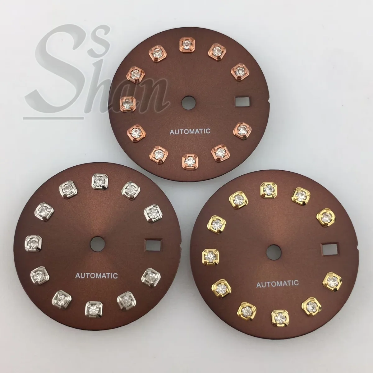 NH05 20.5mm dial with gold silver rose gold diamond indices is paired with a 26mm NH05 movement component a brown sunburst dial