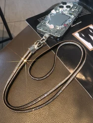 Cordón cruzado para teléfono móvil con diamantes de imitación, correa para el cuello, cuerda de cadena antipérdida con Clip Universal, colgante de tendencia para funda de teléfono móvil, nuevo