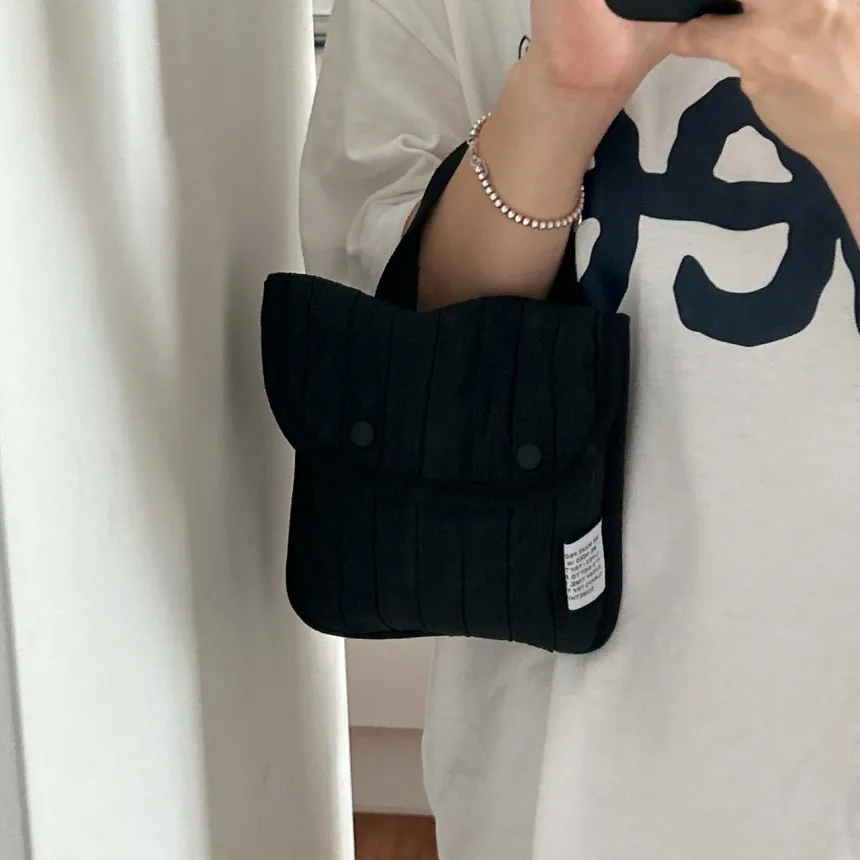 シンプルな単色リップスティックメイクアップバッグ、ポータブル収納バッグ保護カバー、ダブルボタンデュアルカラーハンドヘルド収納小型バッグ