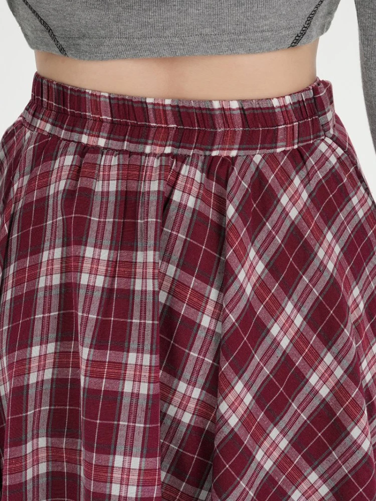 الوافدين الجدد الرجعية منقوشة المرأة غير النظامية تنورة مع ضمادة الخريف موضة فضفاضة عالية الخصر مربوط ميدي التنانير سيدة