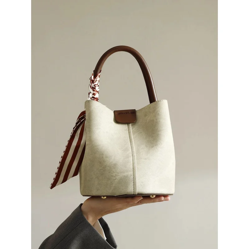 

Сумка-ведро2026Весенняя новая женская сумка Модная текстура Простая универсальная сумка через плечо Сумка для мамы Дополнительная Sc