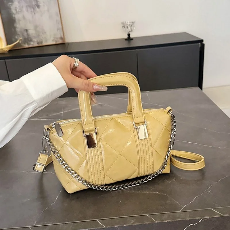 

Женская сумка через плечо из тонкой кожи и повседневным простым винтажным и известным вечным стилем ​